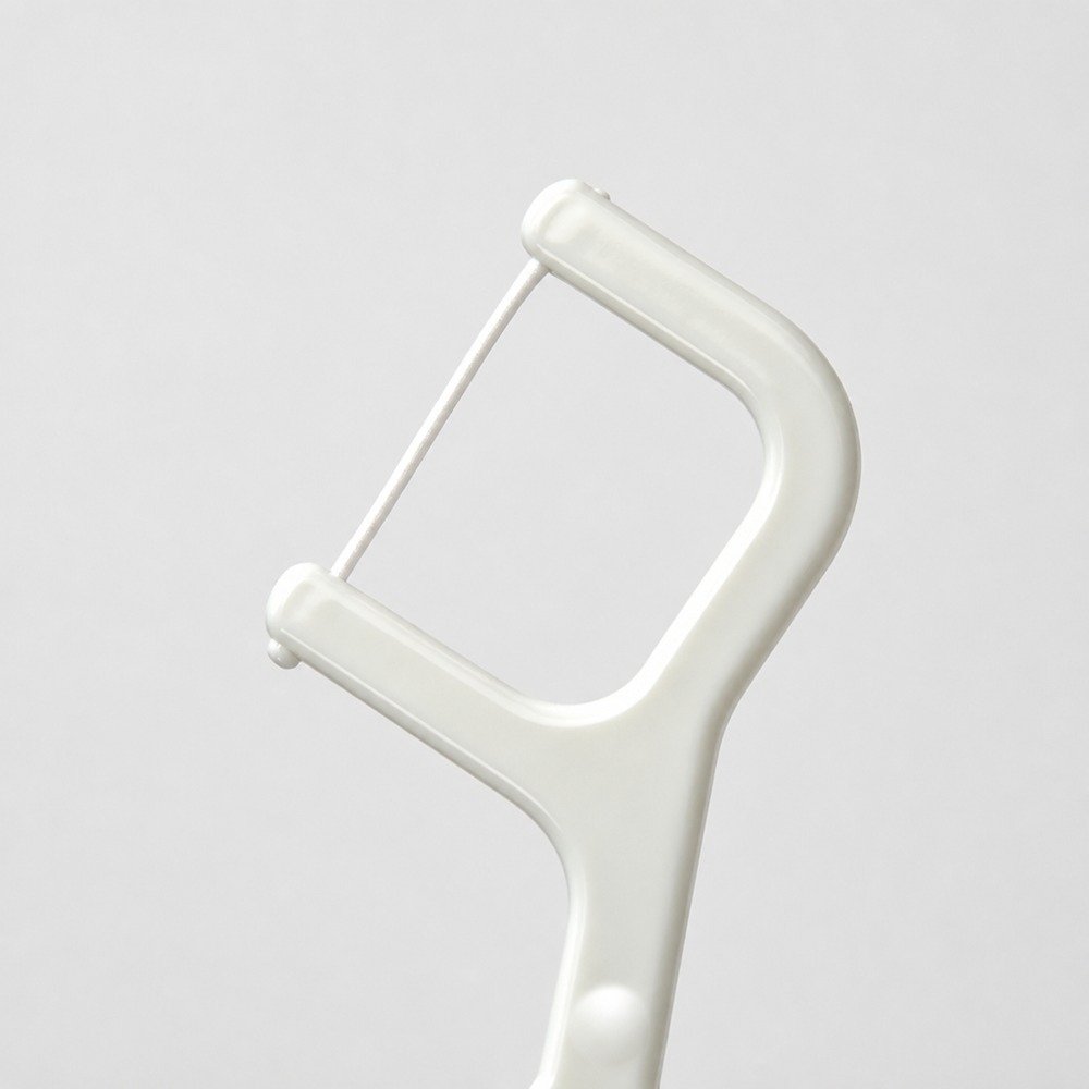 Adult Dental Floss Pick A3 - Slim Straight Handle - close-up detail