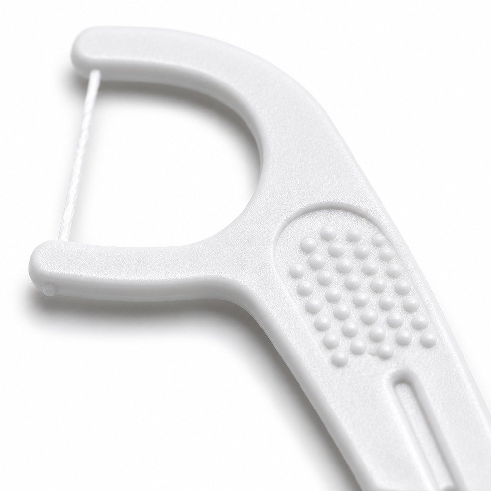 Adult Dental Floss Pick A16 - Ribbed Curve Handle - close-up detail