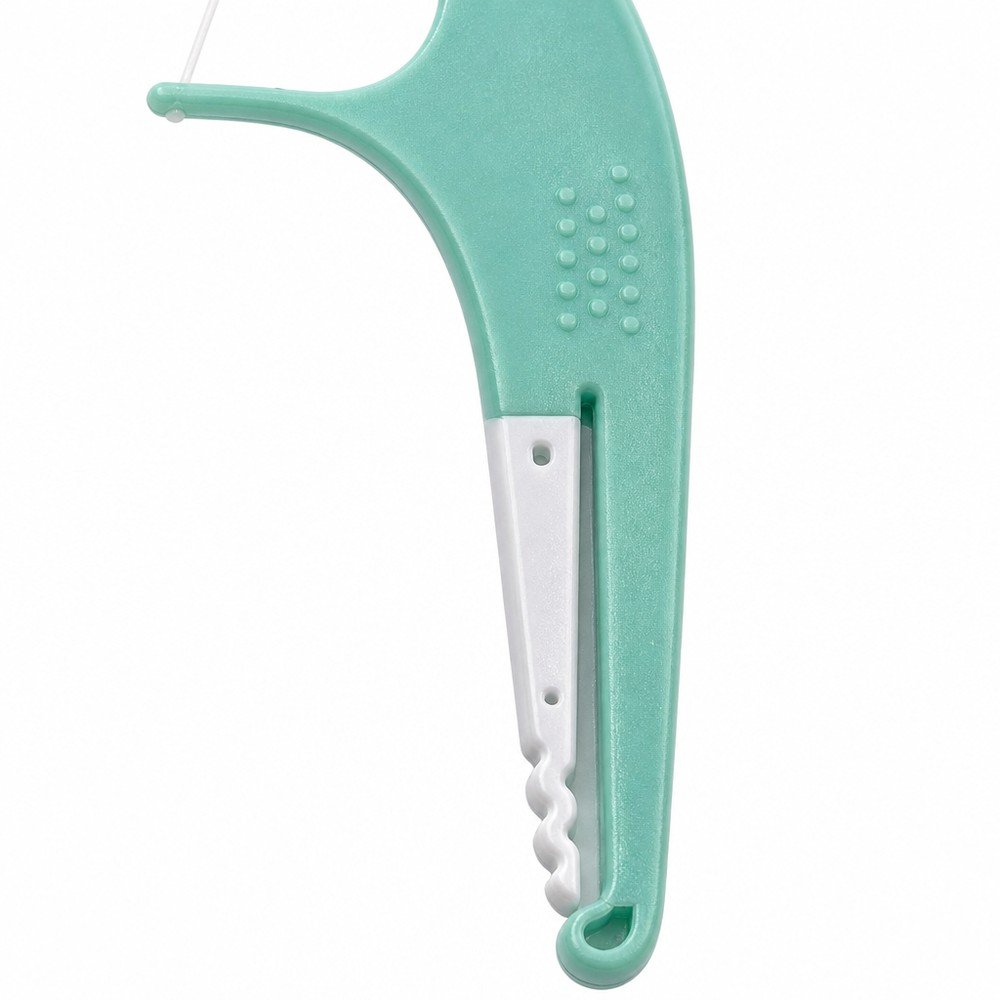 Adult Dental Floss Pick A15 - Mint Green Slim Handle - close-up detail