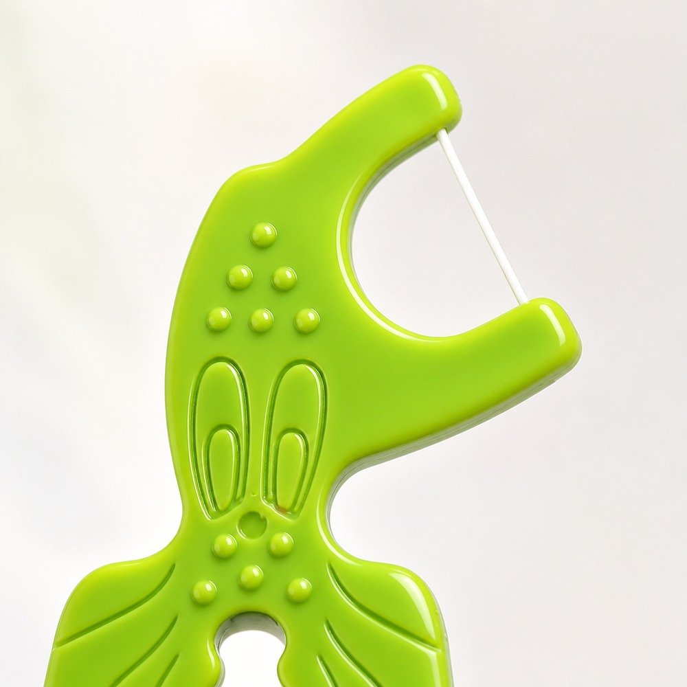 Kids Dental Floss Pick K1 - Crocodile Character - close-up detail