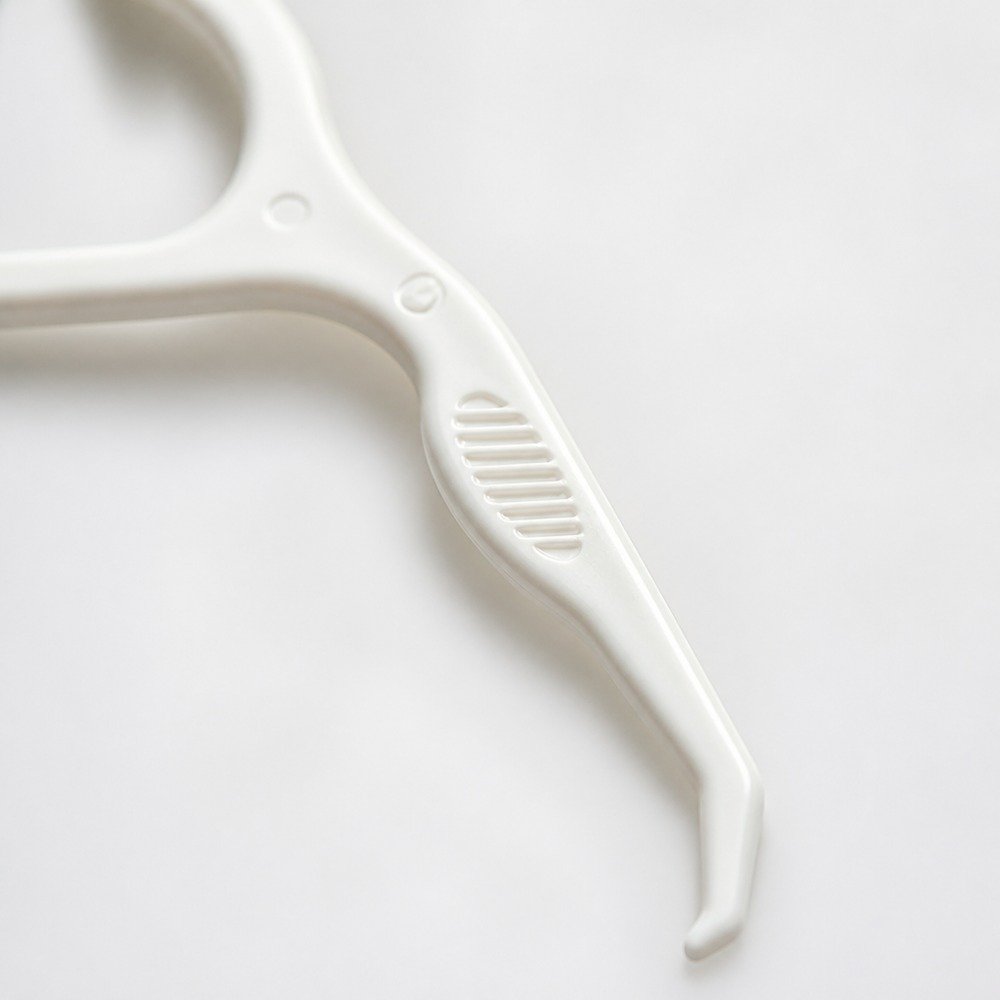 Adult Dental Floss Pick A2 - Contoured Grip Handle - close-up detail