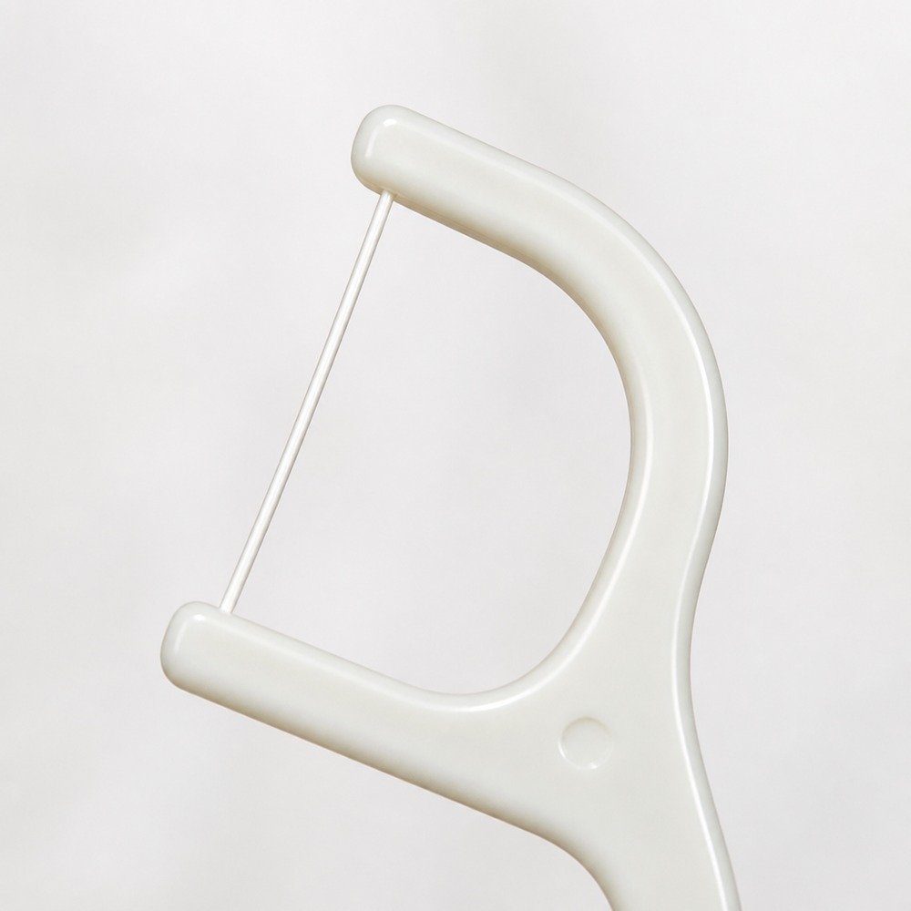 Adult Dental Floss Pick A2 - Contoured Grip Handle - close-up detail